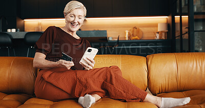 Buy stock photo Phone, payment and mature woman with credit card for online shopping sale, eft transaction or savings. Excited, person or digital banking in home with fintech, ecommerce purchase and discount on app.