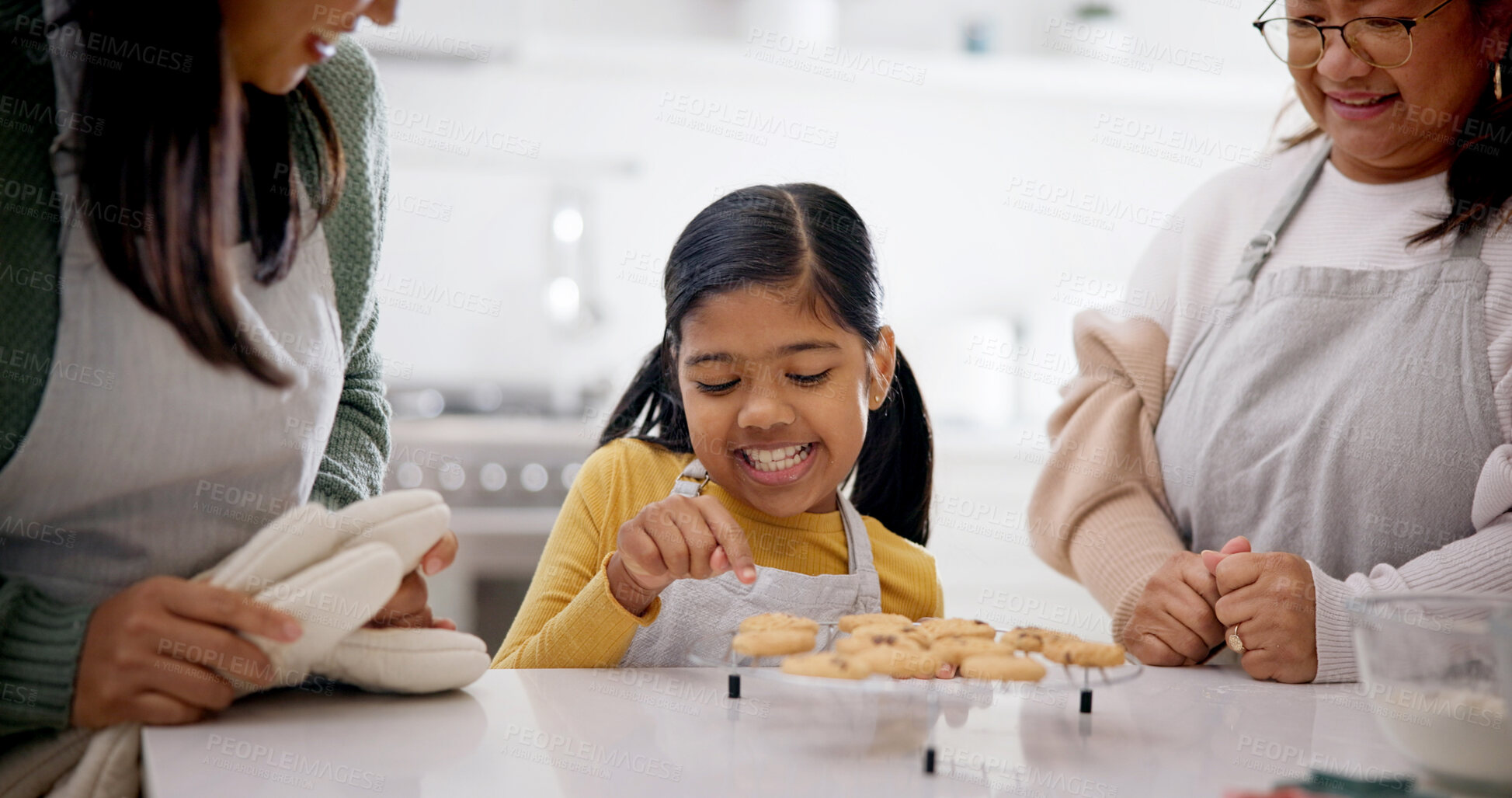 Buy stock photo Family, baking and cookies in home with child, learning and bonding with homemade treats. Mother, grandmother and biscuits in kitchen with daughter, culinary skills and anticipation for baked dessert