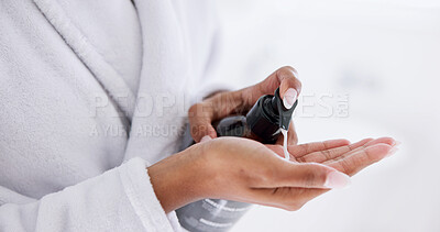 Buy stock photo Hands, skincare and woman with cream in bottle for moisturizer, hydration and wellness. Lotion, cosmetics and squeeze product for dermatology, treatment and person with morning routine in home