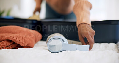Buy stock photo Hands, headphones and packing suitcase in bedroom of home for holiday, trip or travel. Technology, getting ready and luggage with tourist person in apartment for vacation, weekend or preparation