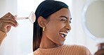 Woman, mirror and face roller with dermatology, lymphatic drainage results and wellness in house. Happy, female person and beauty tools in home with skincare, facial massage and inflammation relief.