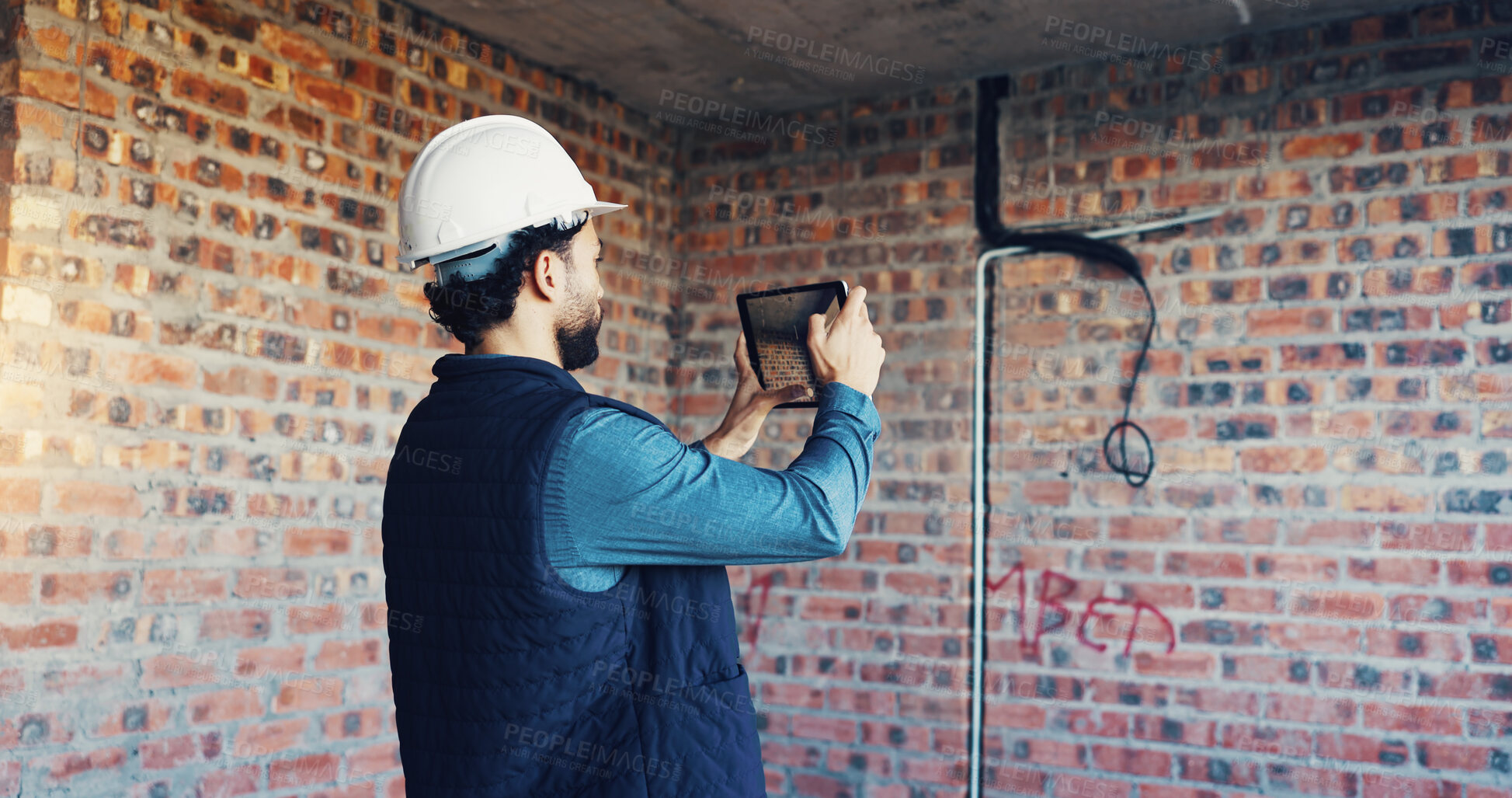 Buy stock photo Photography, architect or man with inspection in building, property remodeling or infrastructure check. Back, site evaluation and person with tablet for report, renovation or electrical line picture