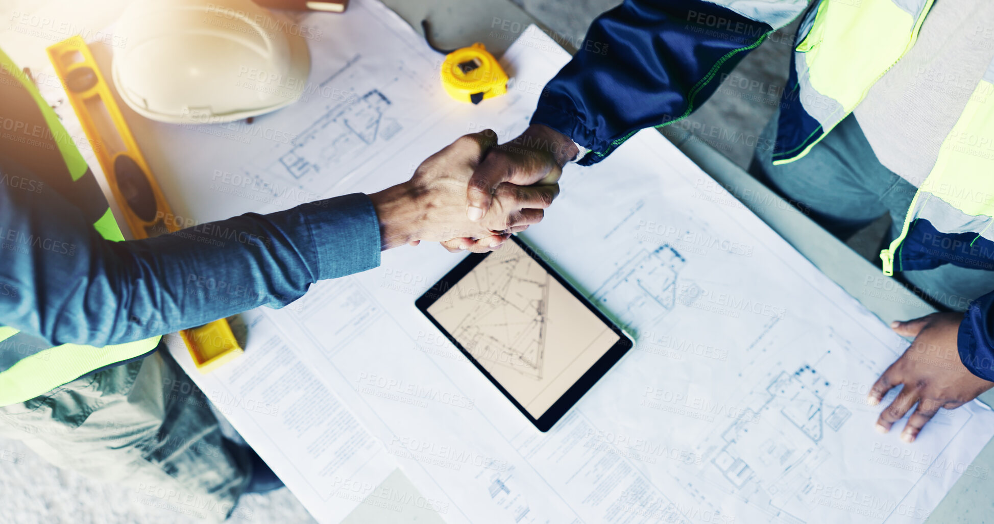 Buy stock photo Engineer, architect and tablet or handshake by blueprint for partnership, meeting and construction site. Men, team collaboration and above tech or floor plan for agreement, deal or building process