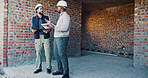Engineer, team and talking with tablet for construction, inspection and feedback on renovation. Men, discussion or digital with clipboard for architecture, building expansion and planning for project