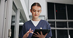 Scroll, tablet and thinking with nurse woman in hospital for healthcare, medical results or review. App, planning and schedule with person in dark clinic for internship or residency as student