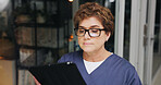 Night, reading and tablet with nurse woman in hospital for healthcare, medical report or research. App, information and review with person in dark clinic for digital feedback, planning or schedule