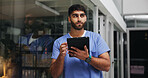 Thinking, nurse and man with tablet for medical idea, research or schedule at night in hospital. Tech, worker and person in clinic for healthcare planning, problem solving and overtime by glass