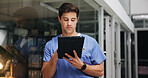 Night, nurse and man with tablet for medical info, research or admin schedule in hospital. Tech, worker and person in clinic with healthcare insurance, reading report or review on overtime by glass