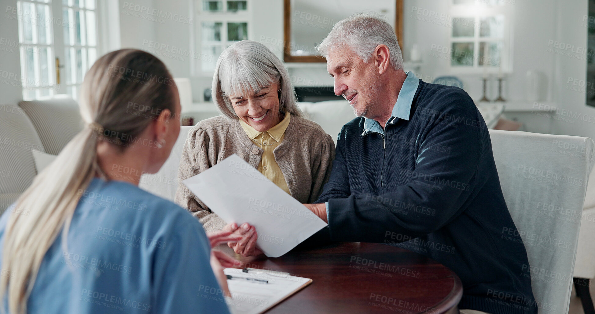 Buy stock photo Smile, caregiver and old couple in home with document, form and report for medical results. Nurse, senior people and reading at house with paperwork, application and information for health insurance