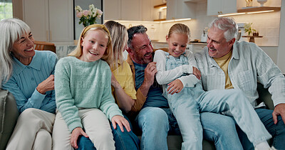 Buy stock photo Happy, relax or laughing with big family on home sofa for funny joke, bonding or weekend together. Parents, grandparents and children with smile on couch for playful holiday or generations in house