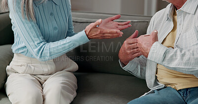 Buy stock photo Couple, hands or fight on sofa in home discussion with conflict for argument or disagreement. Relationship, breakup or people in living room dispute for confession, marriage or confrontation in house