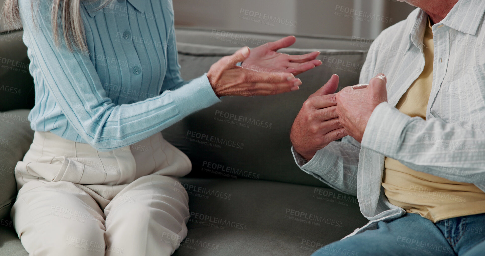 Buy stock photo Couple, hands or fight on sofa in home discussion with conflict for argument or disagreement. Relationship, breakup or people in living room dispute for confession, marriage or confrontation in house