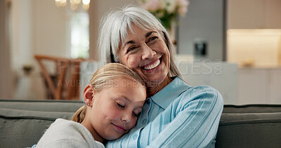 Buy stock photo Trust, grandmother and child on sofa with hug, bonding together and support in childcare. Smile, family and grandchild in house with embrace, security and happy connection in loving relationship.