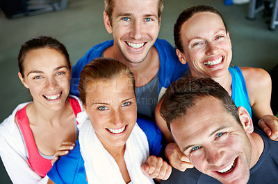 Buy stock photo Close-up shot of a small group of men and women in sports clothing