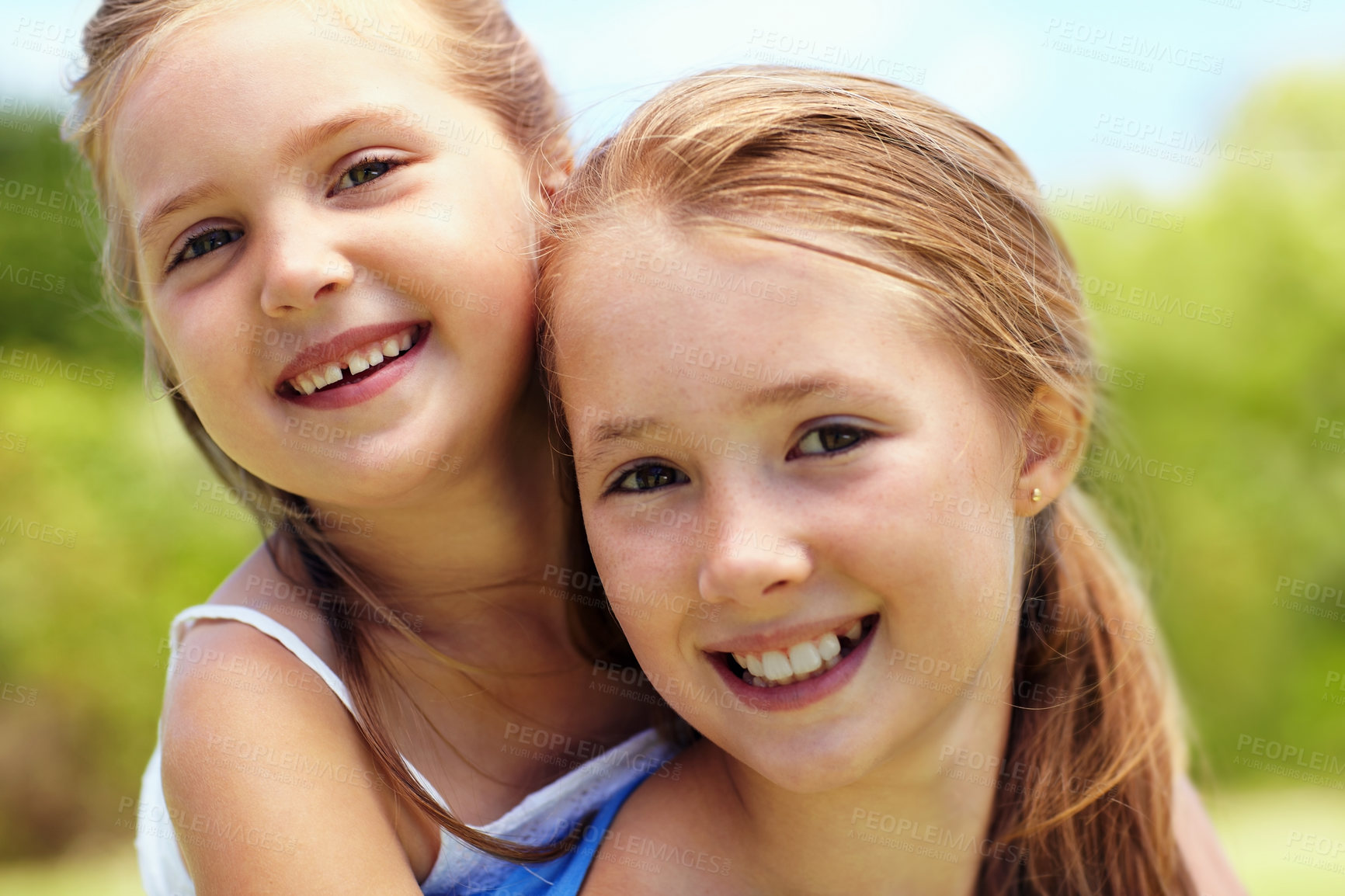 Buy stock photo Portrait, girl or sisters with smile in nature for fun childhood, growth or support together in park. Happy, children or kids with embrace or piggyback for playful weekend, holiday or outdoor bonding