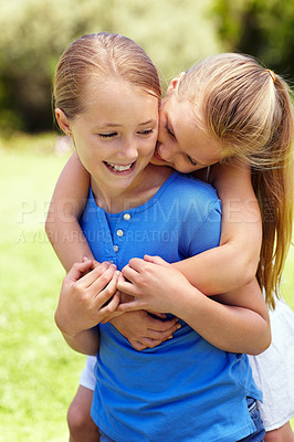 Buy stock photo Happy, children and sisters in backyard with hug, connection and love for bonding together on weekend. Girls, embrace and siblings outdoor with family wellness, childhood memories and friendship.
