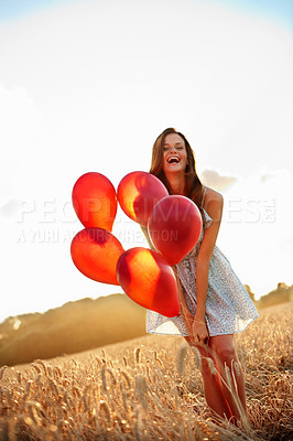 Buy stock photo Balloons, woman and portrait in wheat field for freedom, vacation or happiness for travel fun. Smile, girl and excited outdoor for weekend trip with holiday, confidence and celebration for adventure