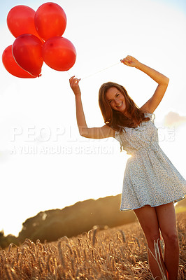 Buy stock photo Balloons, girl and portrait in wheat field for freedom, vacation or happiness for travel fun. Smile, woman and excited outdoor for weekend trip with holiday, confidence and celebration for adventure