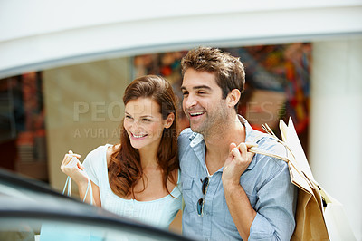 Buy stock photo Happy, shopping and escalator with couple in mall for retail purchase, anniversary gift and support. Store discount, customer promotion and love with man and woman with bags for boutique shopper