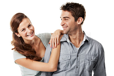Buy stock photo Couple, love and embrace in studio, laughing and bonding with partner, portrait and support on break. White background, lovers and happy people with commitment for relationship, connection or loyalty