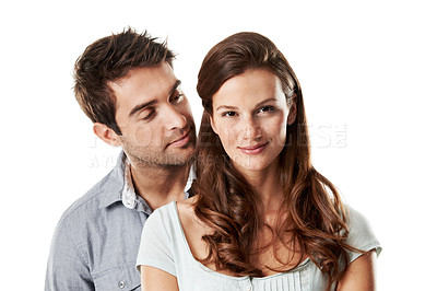 Buy stock photo Love, smile and trust with couple in studio for connection, support and bonding together. Marriage commitment, romance and loyalty with man and portrait of woman on white background for partner
