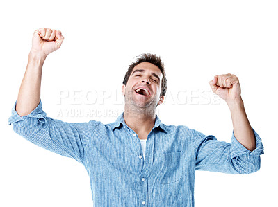 Buy stock photo Winner, excited and man in studio with fist pump, celebration and reaction for lottery success. Victory, happy and person with gesture for winning, giveaway and reward for bonus on white background