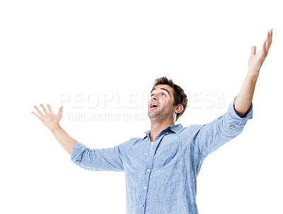Buy stock photo Relief, success or happy man with open arms in studio for winning or good news on a white background. Male person, smile or celebration with selection, option or choice for freedom on mockup space