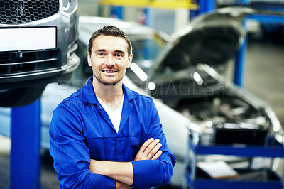Buy stock photo Service, arms crossed or repairman in workshop with portrait, ambition or about us as car technician. Happy, man or auto engineer in garage with uniform, confidence or pride in vehicle maintenance.