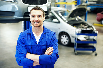 Buy stock photo Service, arms crossed or mechanic in repair shop with portrait, ambition or about us as motor technician. Smile, man or auto engineer with uniform, confidence or career pride in vehicle maintenance.