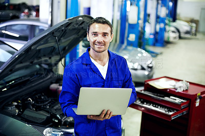 Buy stock photo Portrait, smile and mechanic in workshop with laptop, internet and software for engineering career. Happy, technology and garage for car diagnostics, maintenance and auto or vehicle service or tuning