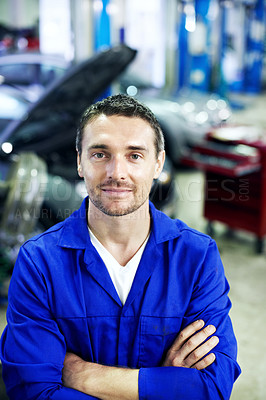 Buy stock photo Portrait, man and car mechanic in workshop with arms crossed, smile and pride for engineering career. Happy, confident and garage for repair, maintenance and auto or vehicle service specialist