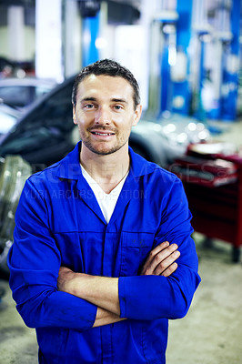 Buy stock photo Portrait, smile and mechanic in garage with arms crossed, career and pride for engineering job. Man, confident and workshop for car repair, maintenance and auto or vehicle service specialist