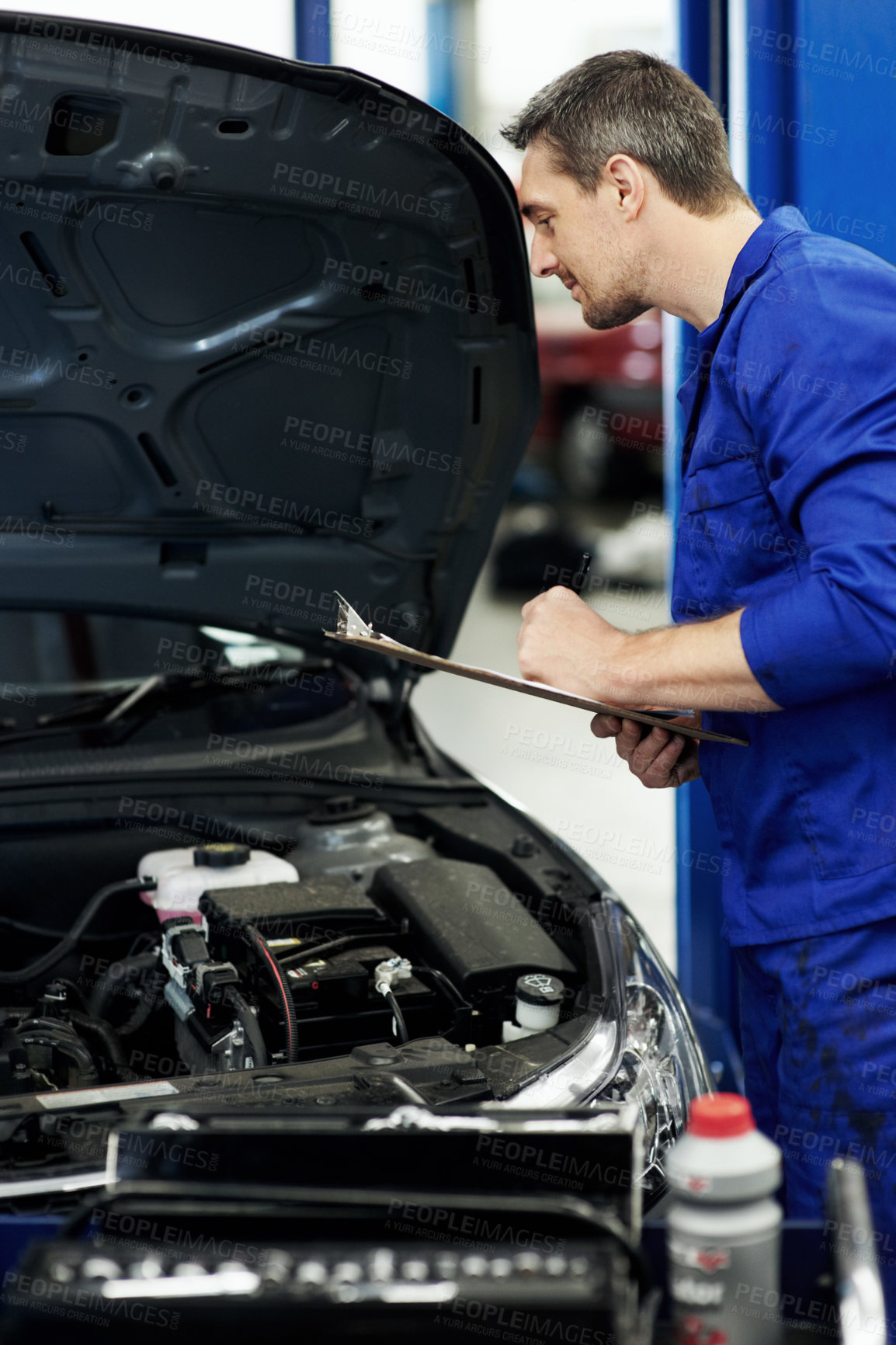 Buy stock photo Man, engineer and writing on clipboard for car at workshop  for notes, inspection or repair services. Person, technician or mechanic with vehicle, checklist and maintenance with career at auto garage