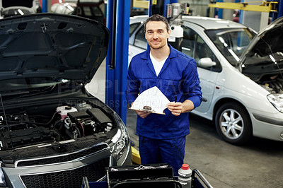 Buy stock photo Man, technician and clipboard for car service at garage in portrait for notes, inspection or repair. Person, mechanic or engineer with vehicle, checklist and confidence for career at auto workshop