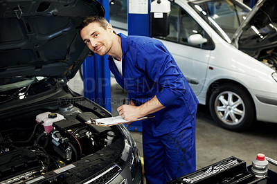 Buy stock photo Man, mechanic and clipboard for car at garage in portrait for notes, inspection or repair services. Person, technician or engineer with vehicle, checklist and confidence for career at auto workshop