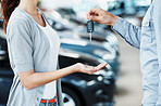 Receiving the keys to her new car