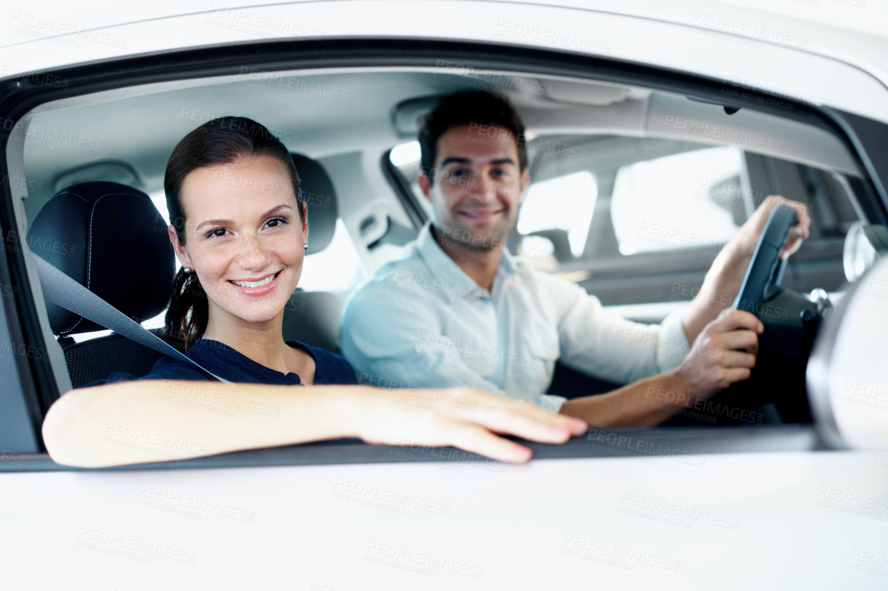 Buy stock photo Dealership, portrait and smile of couple in car together for choice, purchase or test drive. Retail, sale and window with happy customer people in showroom for decision, shopping or vehicle finance