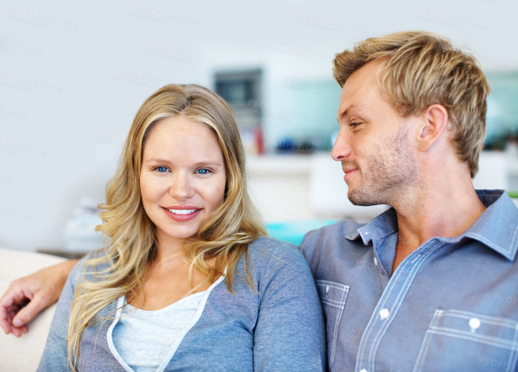 Buy stock photo Happy, couple and relax in living room with love, support and peace for connection on weekend break. Portrait, people dating and bonding in house with romantic relationship, loyalty and commitment.