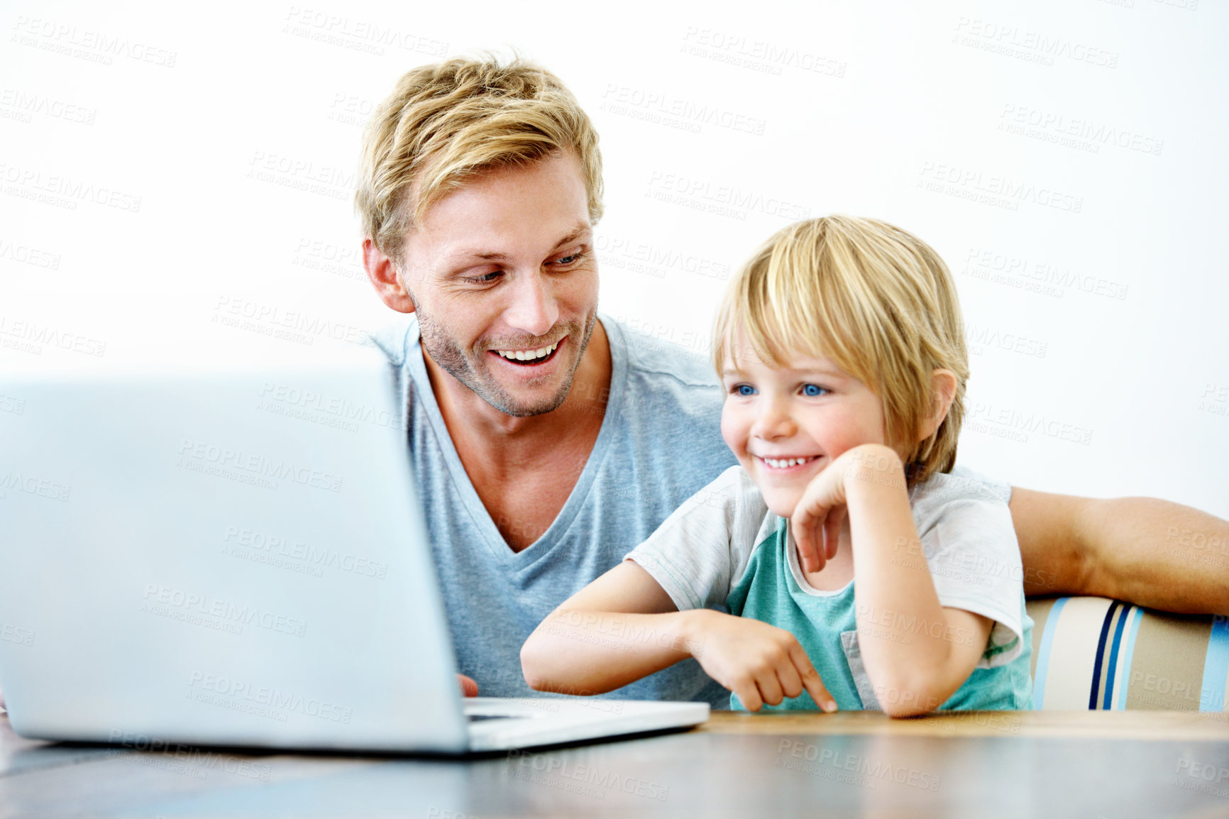 Buy stock photo Smile, laptop and learning with father and child for education, support and kindergarten project. Homework, knowledge and pre school prep with man and boy in family home for online tutor and help