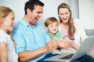Buy stock photo Parents, children and laugh with laptop on sofa for comedy movie, weekend entertainment or bonding. Relax, happy family and kids with tech in home for funny online series, streaming film and support 