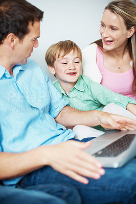 Buy stock photo Parents, child and watching movie in home with laptop, bonding together and conversation for cartoon. Happy, mother and father in house with son, entertainment and computer for streaming kids show.