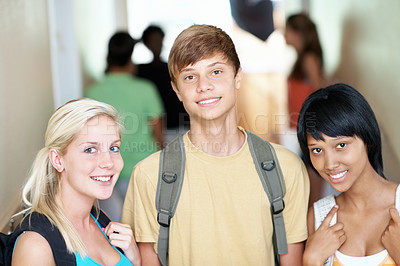 Buy stock photo Teen, friends and happy in hallway at high school for scholarship, study break and ready to learn. Students, girls and boy with backpack at academy for development, education portrait or class recess