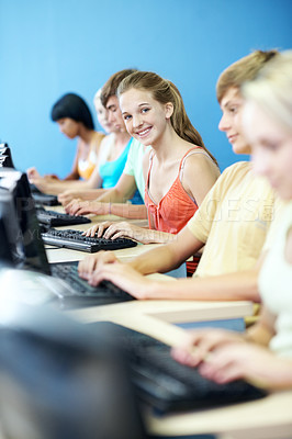 Buy stock photo Education, happy girl and typing with computer in class for development, IT curriculum and portrait. Smile, teen student and desktop for knowledge, learning software and classmates in high school
