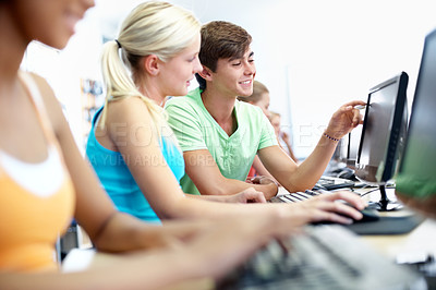 Buy stock photo Computer, learning and discussion with students in classroom for education, lecture or IT lesson. Teenager, high school and tech help with people for programming class, online assessment or project