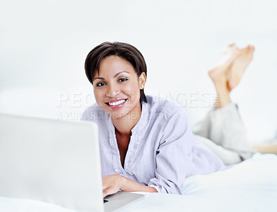 Buy stock photo Portrait, relax and woman in bedroom with laptop, streaming and movie research for weekend break. Space, female person and smile at house with pc, browsing website and download film for subscription