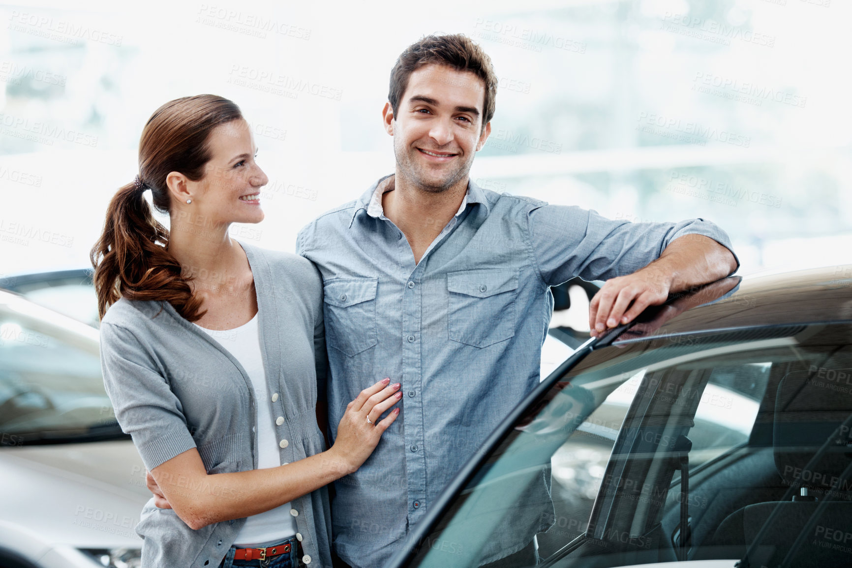 Buy stock photo Couple, smile and customer shopping in car dealership with support, sale promotion and motor insurance. Portrait, married people and browsing in store for new vehicle, discount or investment decision