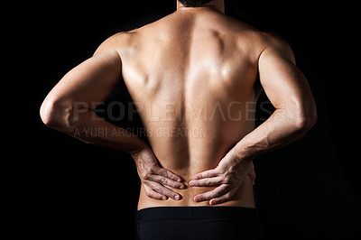 Buy stock photo Shirtless, body and man in studio for back pain, inflammation or injury with arthritis. Fibromyalgia, sprain and male person by black background with muscle tension, accident or joint ache.