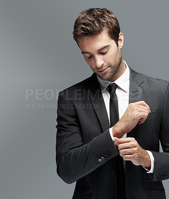 Buy stock photo Space, professional and cuff with business man in studio for mockup, corporate and financial advisor. Portfolio manager, broker and confidence with male employee on gray background for pride