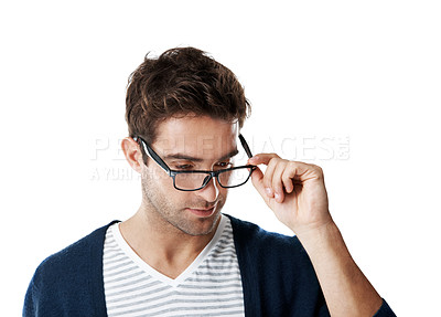 Buy stock photo Man, glasses and clear vision in studio with eyewear decision, consider prescription lens or wellness. Person, check spectacles and eye care with optometry, thinking or reflection on white background