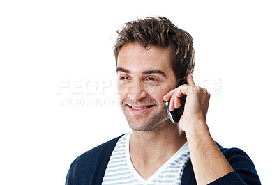 Buy stock photo Phone call, smile and man in studio, gossip and discussion with contact and network with technology. White background, communication and person with mobile, space and listen to conversation on break